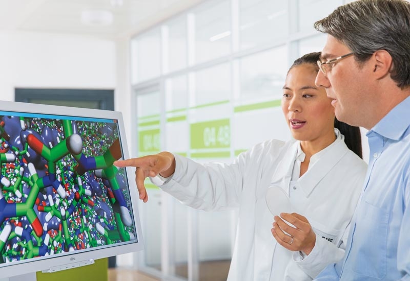 Chemist Dr Fangfang Chu (left) and simulation expert Dr Eduard Schreiner of BASF discuss the computer simulation of a microencapsulation. Chemist Dr Fangfang Chu (left) and simulation expert Dr Eduard Schreiner of BASF discuss the computer simulation of a microencapsulation.