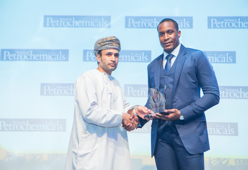 Derrick Best (right), sales executive at Oil & Gas Middle East hands over the trophy to Said Amur Al-Abri of PDO. Derrick Best (right), sales executive at Oil & Gas Middle East hands over the trophy to Said Amur Al-Abri of PDO.