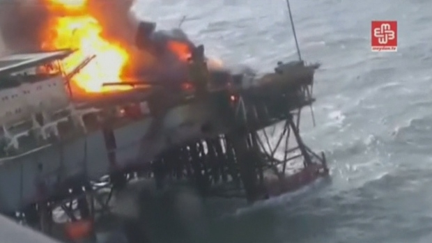 The fire started on Friday after a storm caused a partial collapse of one of the facilities on the oil rig, damaging a natural gas pipeline. The fire started on Friday after a storm caused a partial collapse of one of the facilities on the oil rig, damaging a natural gas pipeline.