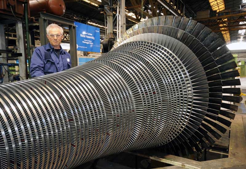 Steam turbine rotor assembly at the GE plant. Steam turbine rotor assembly at the GE plant.