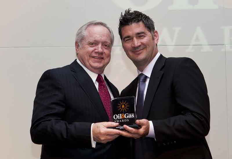 James Larsen, managing director and CEO of Momentum Engineering receiving trophy from Francois Bosman, business development manager at Wings Corporate James Larsen, managing director and CEO of Momentum Engineering receiving trophy from Francois Bosman, business development manager at Wings Corporate