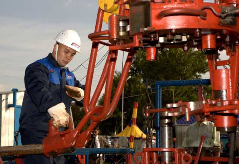 A Tatnefit engineer at work on an oil installation. A Tatnefit engineer at work on an oil installation.
