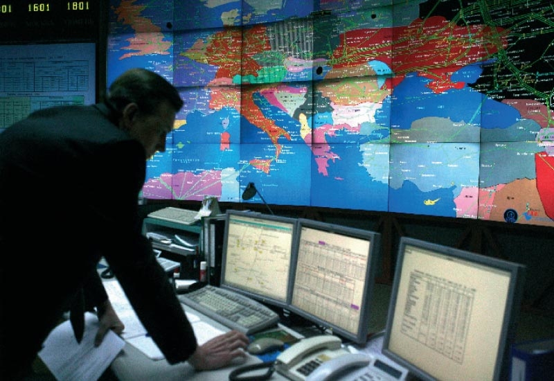 A Gazprom employee oversees the enormous footprint of the company's gas empire. A Gazprom employee oversees the enormous footprint of the company's gas empire.