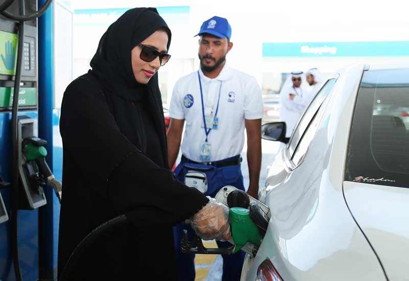 An Emirati woman chooses the self-service option at an ADNOC service station. An Emirati woman chooses the self-service option at an ADNOC service station.