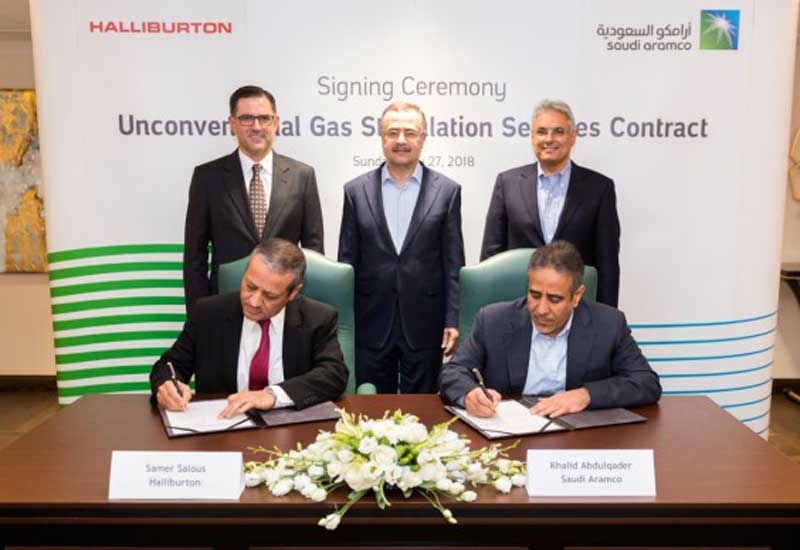 Saudi Aramco president and CEO Amin H Nasser (standing, centre), Halliburton president and CEO Jeffrey A Miller (standing, left) and Saudi Aramco SVP for upstream Mohammed Y Al Qahtani (standing, right), attended the signing ceremony for unconventional gas stimulation services contract on 27 May 2018 at Saudi Aramco headquarters in Dhahran, Saudi Arabia. Saudi Aramco president and CEO Amin H Nasser (standing, centre), Halliburton president and CEO Jeffrey A Miller (standing, left) and Saudi Aramco SVP for upstream Mohammed Y Al Qahtani (standing, right), attended the signing ceremony for unconventional gas stimulation services contract on 27 May 2018 at Saudi Aramco headquarters in Dhahran, Saudi Arabia.