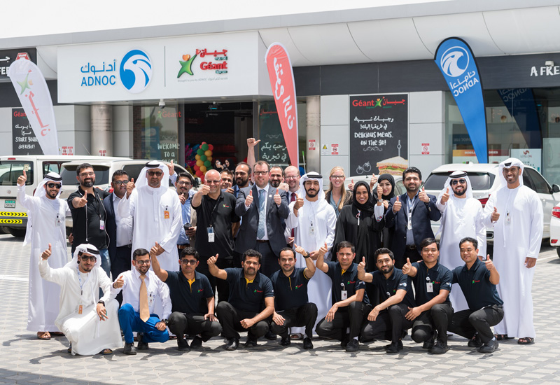 An ADNOC and Geant group photograph. An ADNOC and Geant group photograph.