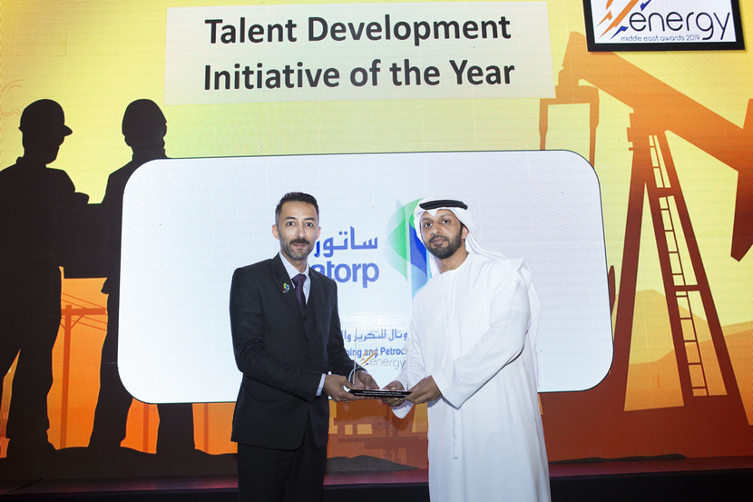 Hassan Al Shakhs (left), public relations officer, SATORP, presents the Talent Development Initiative of the Year Award won by Mubadala Investment Company for the Future Energy Leaders Programme to Jasem Ali Al Teneiji, senior specialist – Emiratisation, Mubadala Investment Company, at the 2019 Middle East Energy Awards. Hassan Al Shakhs (left), public relations officer, SATORP, presents the Talent Development Initiative of the Year Award won by Mubadala Investment Company for the Future Energy Leaders Programme to Jasem Ali Al Teneiji, senior specialist – Emiratisation, Mubadala Investment Company, at the 2019 Middle East Energy Awards.