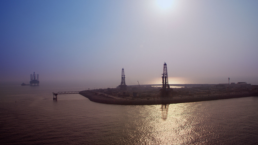 An artificial island, typically used to reduce cost by using land drilling instead of more expensive offshore rigs An artificial island, typically used to reduce cost by using land drilling instead of more expensive offshore rigs